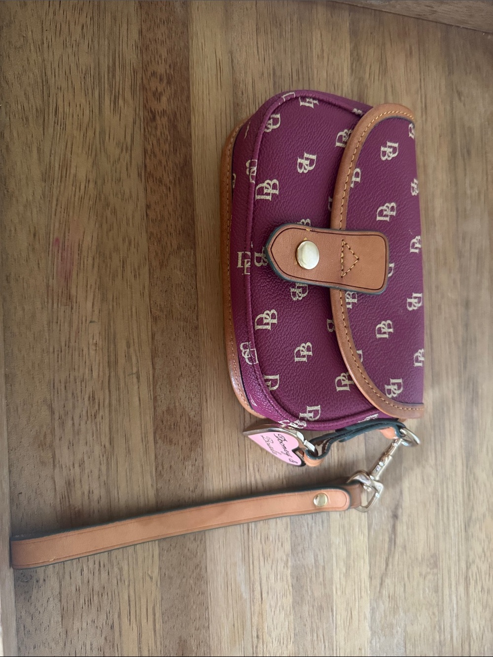 Dooney & Bourke Plum Wristlet with Tan Trim